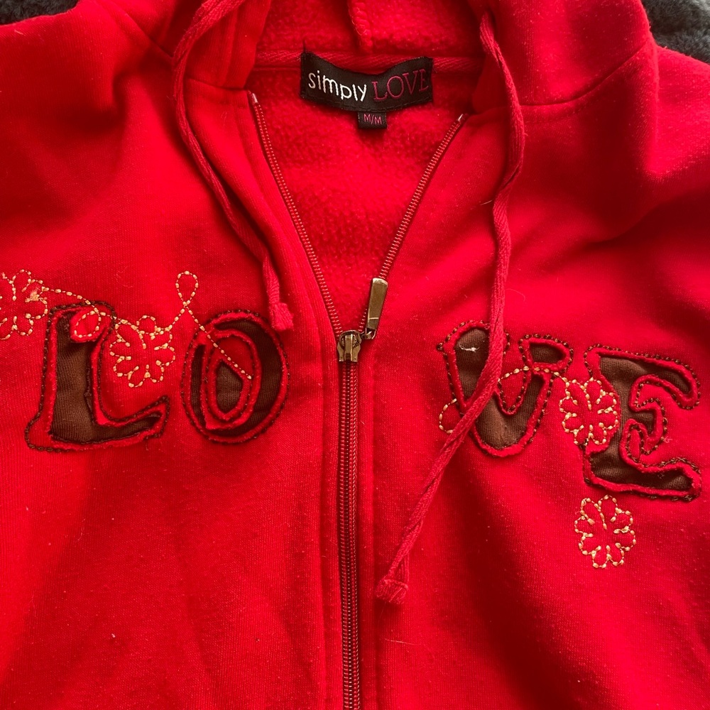 Simply LOVE engraved red zip up hoodie.
